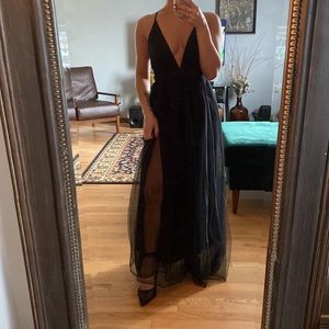 Black gown. Very fun for wedding or party. Very comfortable. Size XS